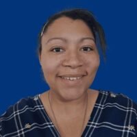 Photograph of Kerise Myers from Inclusion Support Hub with a clear branded blue background