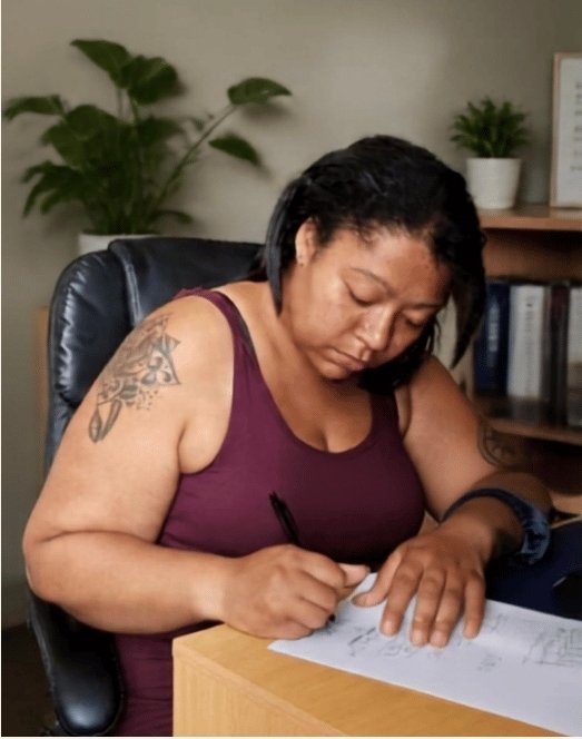 Kerise Myers, CEO, Founder and Project Lead, working on a project at Inclusion Support Hub